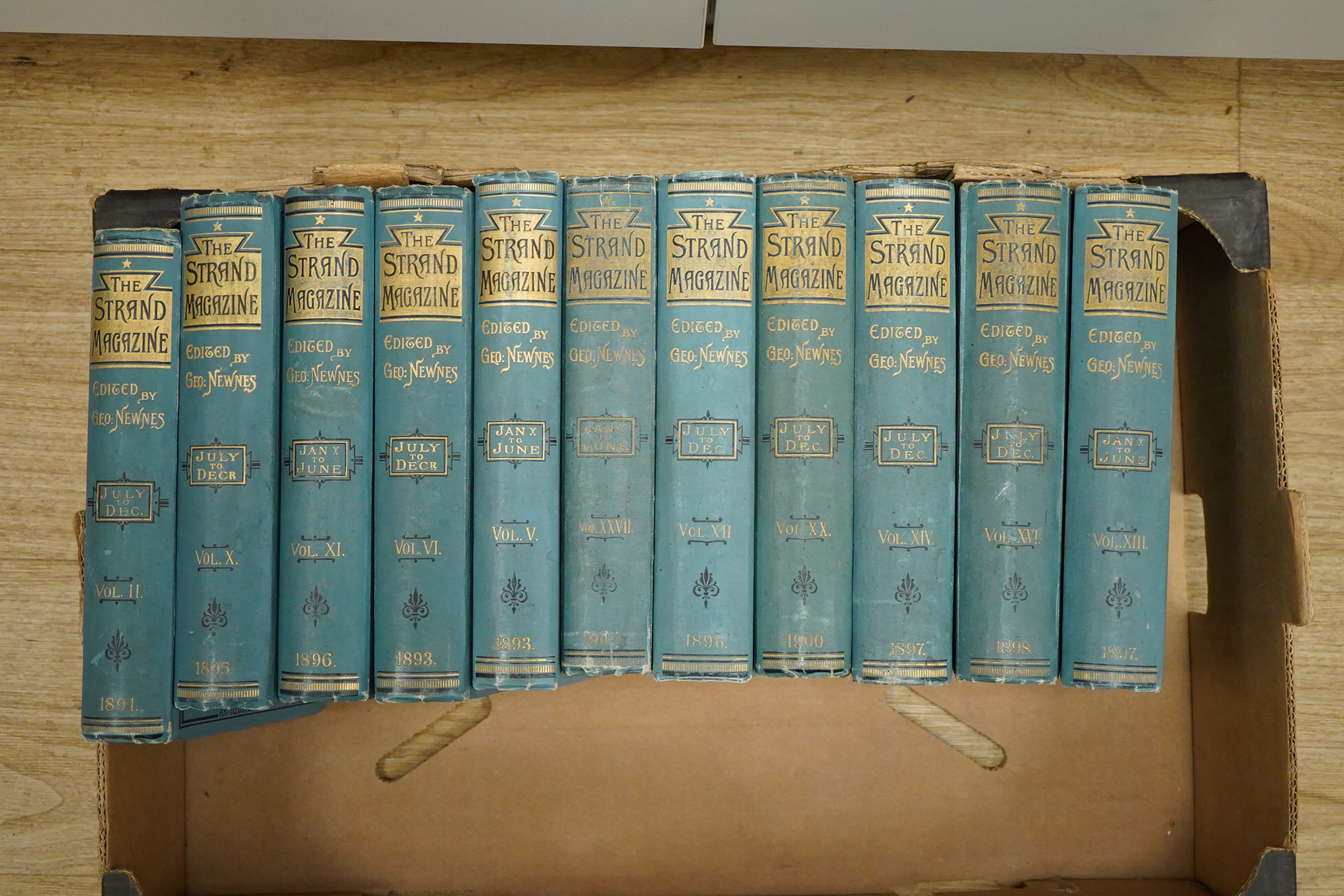 The Strand Magazine: an illustrated monthly ... vols. 1-XX and vol. XXVII. many illus. throughout (num. full page); publisher's Cambridge blue pictorial cloth with gilt spines, roy.8vo. George Newnes, 1891-1900 and 1904.